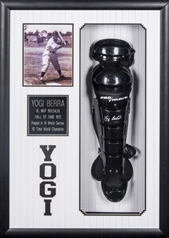 Yogi Berra Signed Leg Guard In 38x27 Shadowbox Display (PSA/DNA)